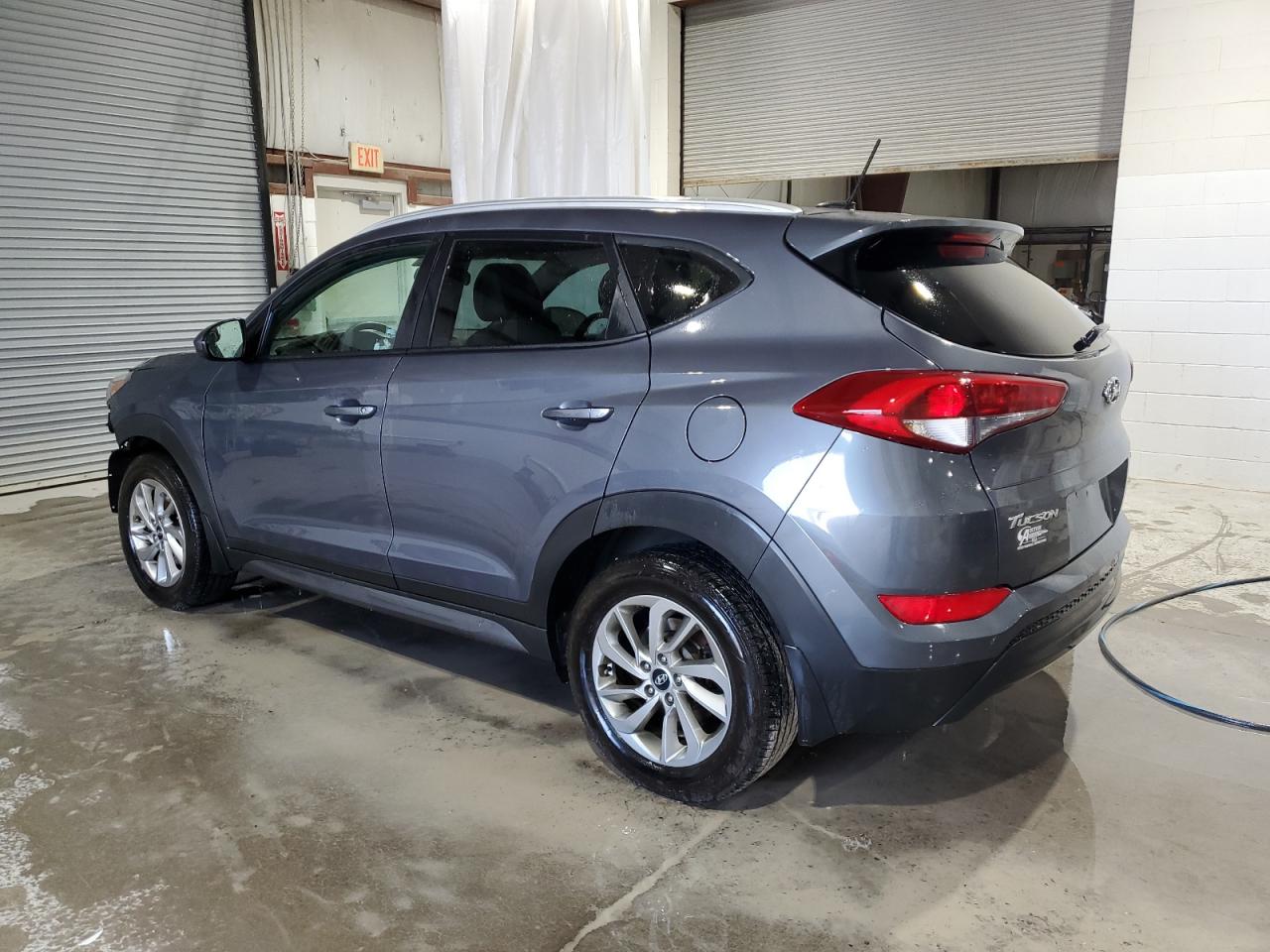 KM8J3CA42GU218258 2016 HYUNDAI TUCSON - Image 2