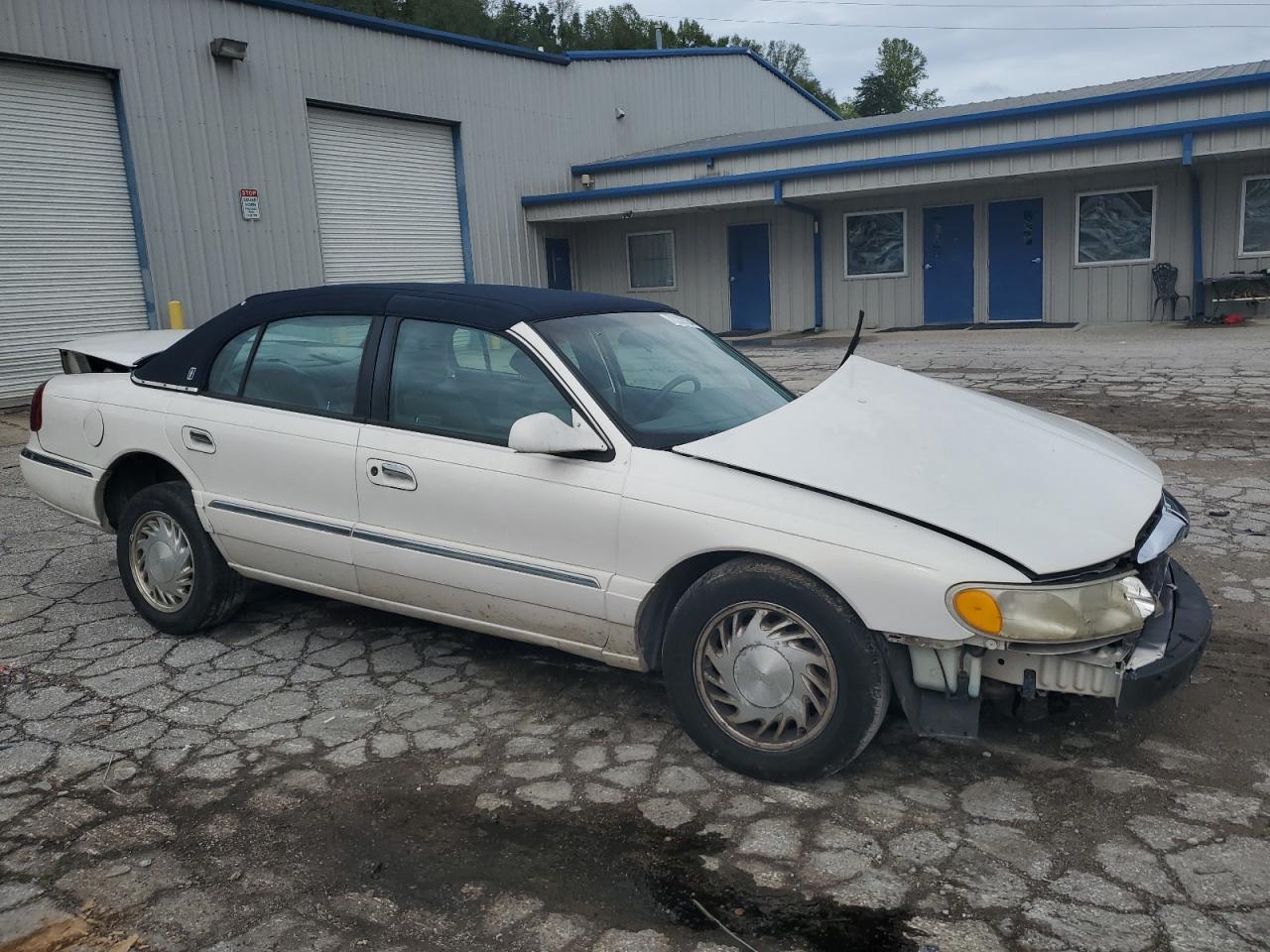 1998 Lincoln Continental VIN: 1LNFM97V8WY676657 Lot: 73322134