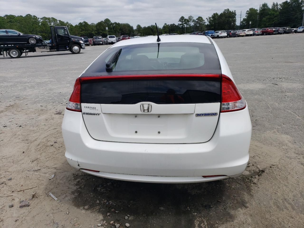 2011 Honda Insight Ex VIN: JHMZE2H72BS004899 Lot: 69949094