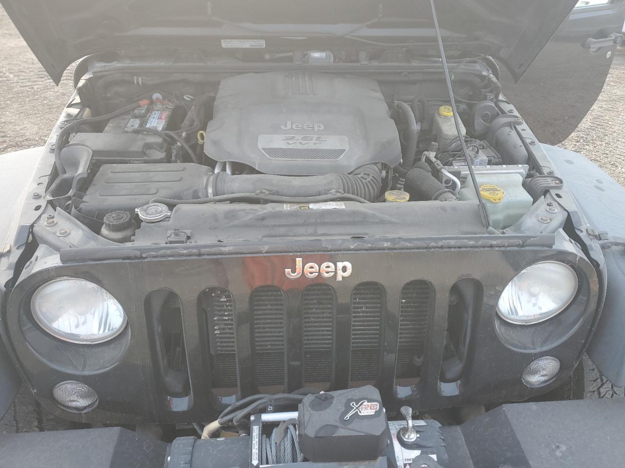 1C4BJWDG7EL313911 2014 Jeep Wrangler Unlimited Sport