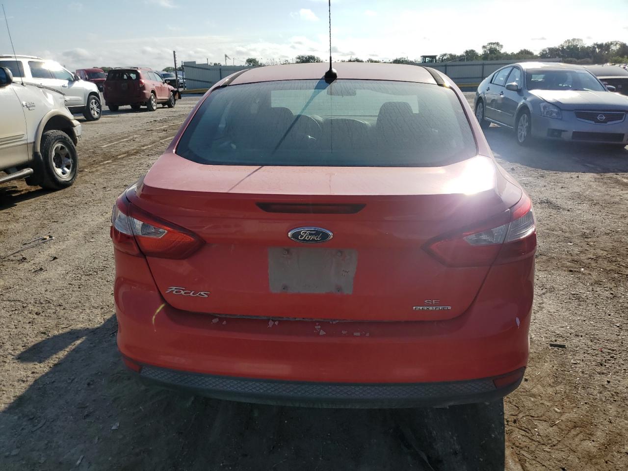 2014 Ford Focus Se VIN: 1FADP3F21EL104726 Lot: 71790334