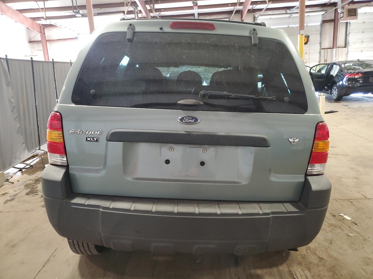 2005 Ford Escape Xlt VIN: 1FMYU03175KD73474 Lot: 70032634