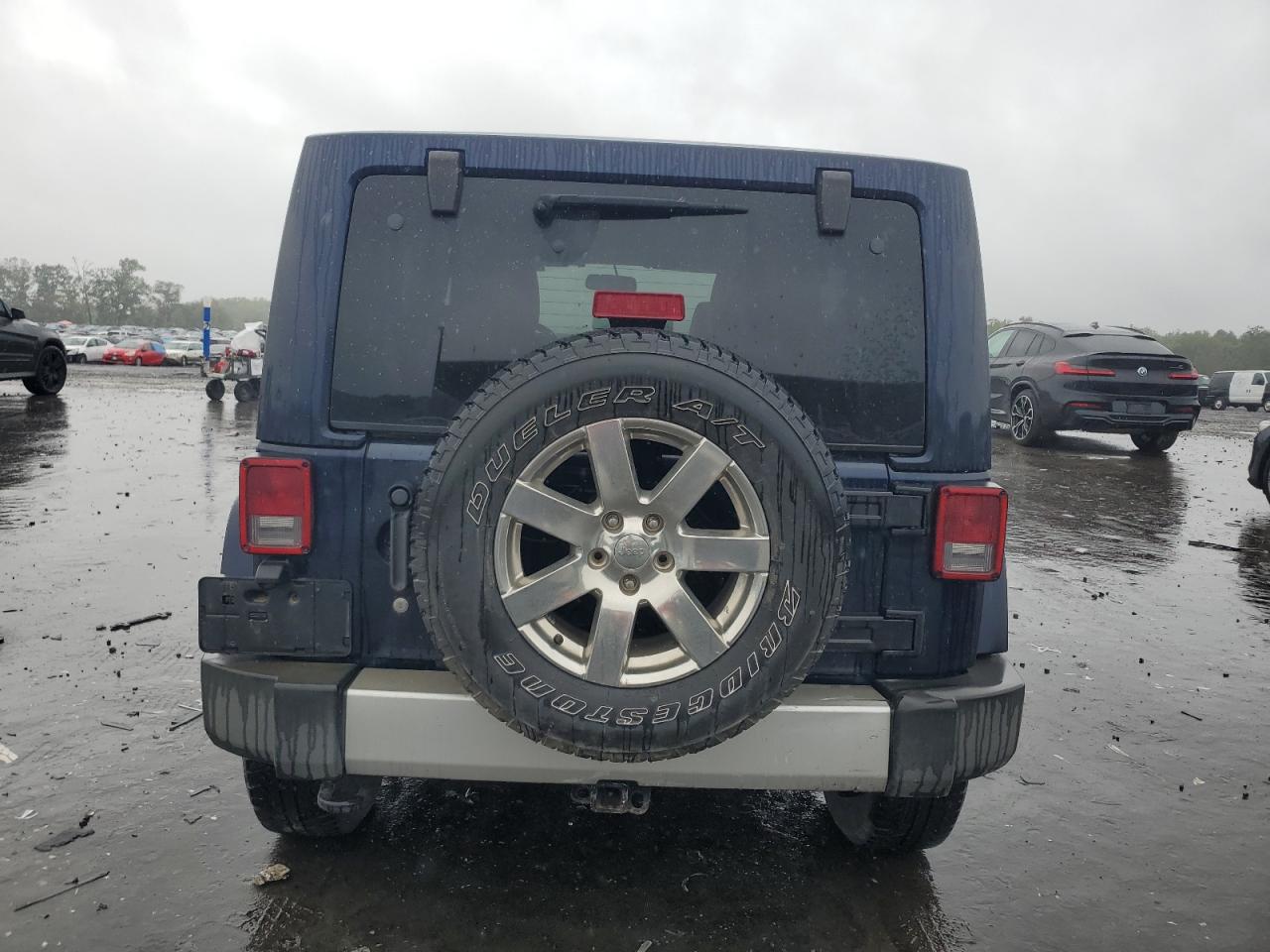 2013 Jeep Wrangler Unlimited Sahara VIN: 1C4HJWEG9DL591572 Lot: 71794974