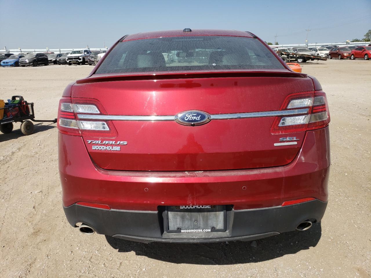 2016 Ford Taurus VIN: 1FAHP2EBXGG124860 Lot: 71426474