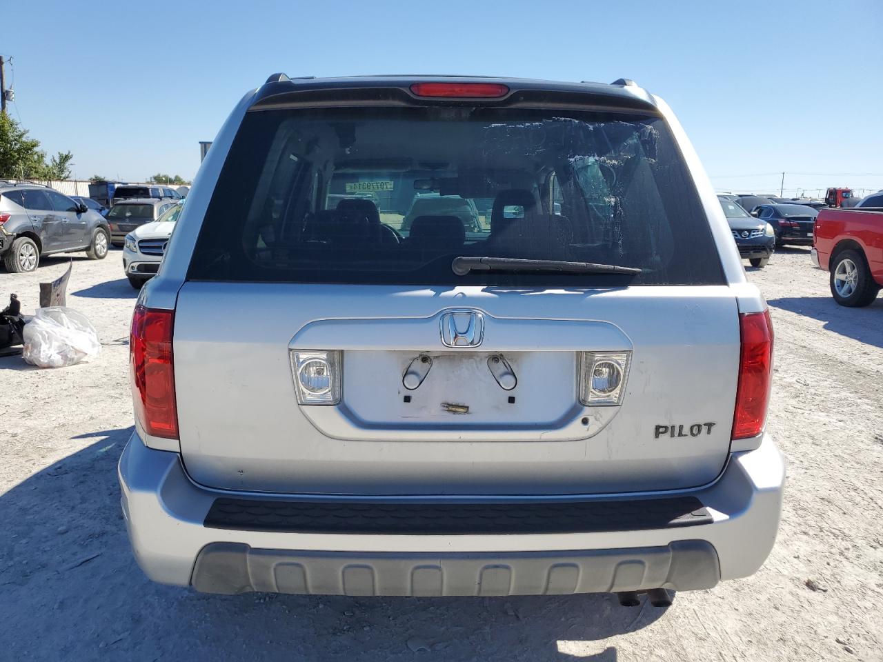 2004 Honda Pilot Lx VIN: 2HKYF18174H553306 Lot: 70779314