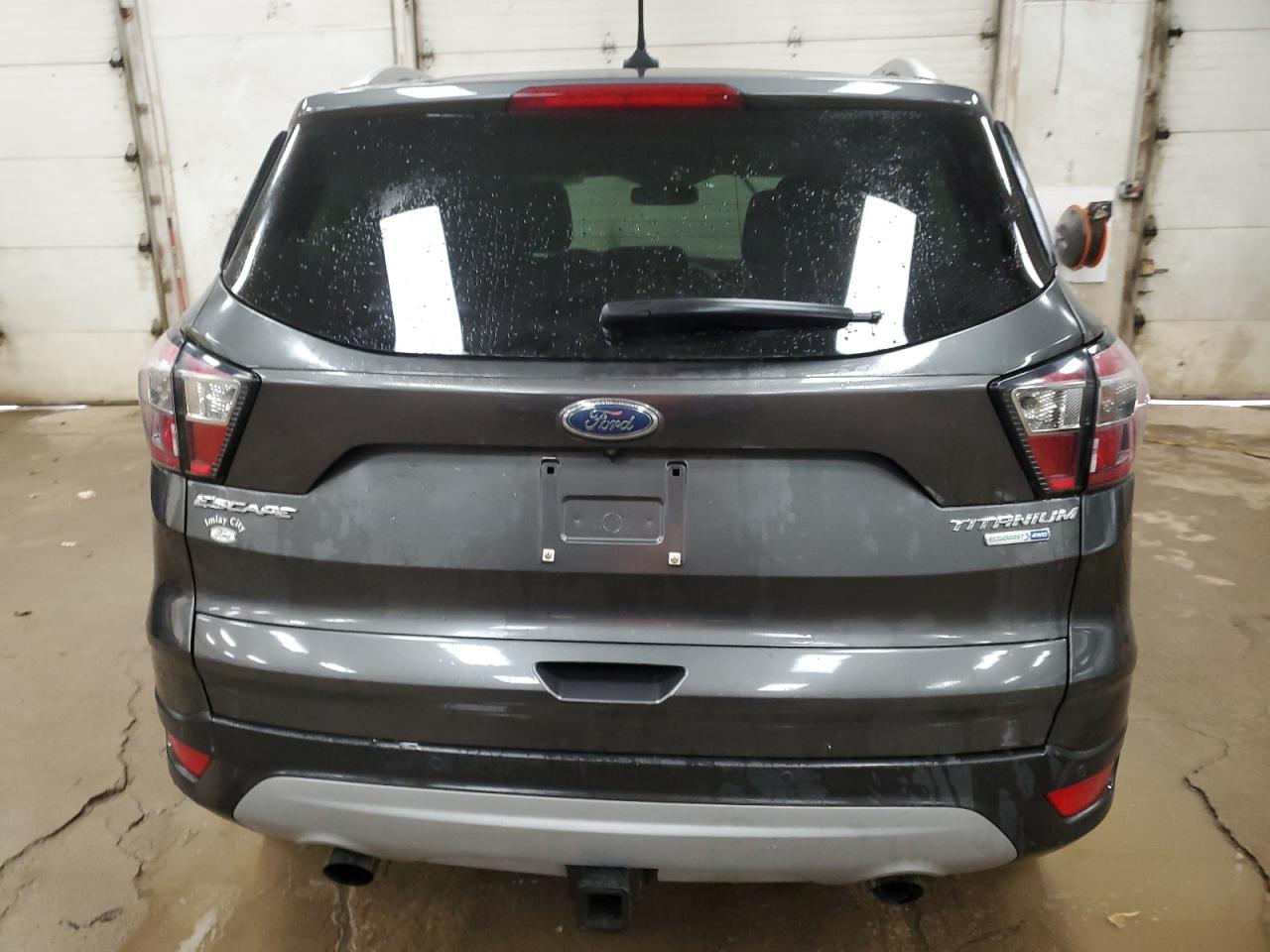 2018 Ford Escape Titanium VIN: 1FMCU9J93JUA21806 Lot: 72786374