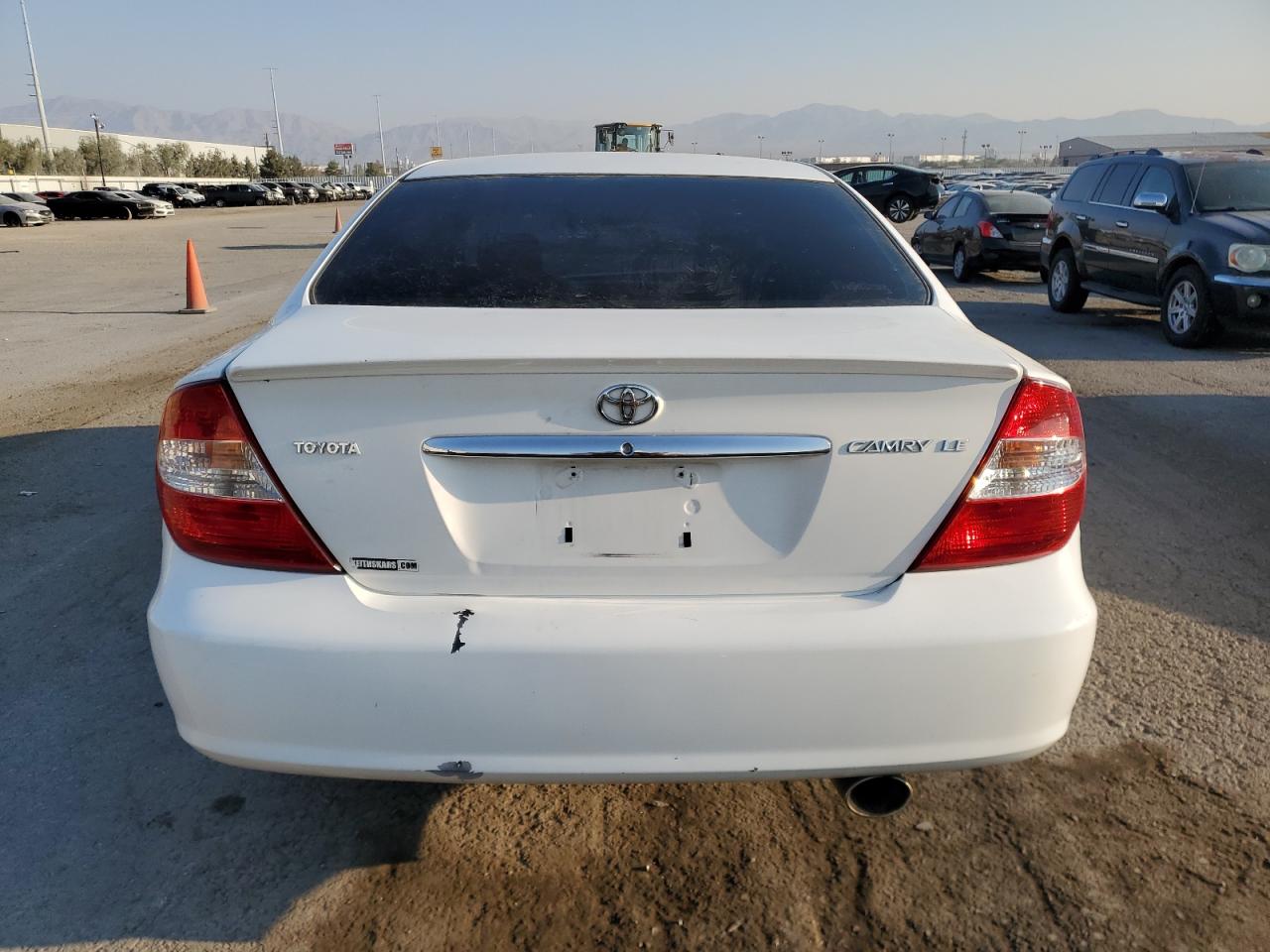 2003 Toyota Camry Le VIN: JTDBE32K030240339 Lot: 70407374