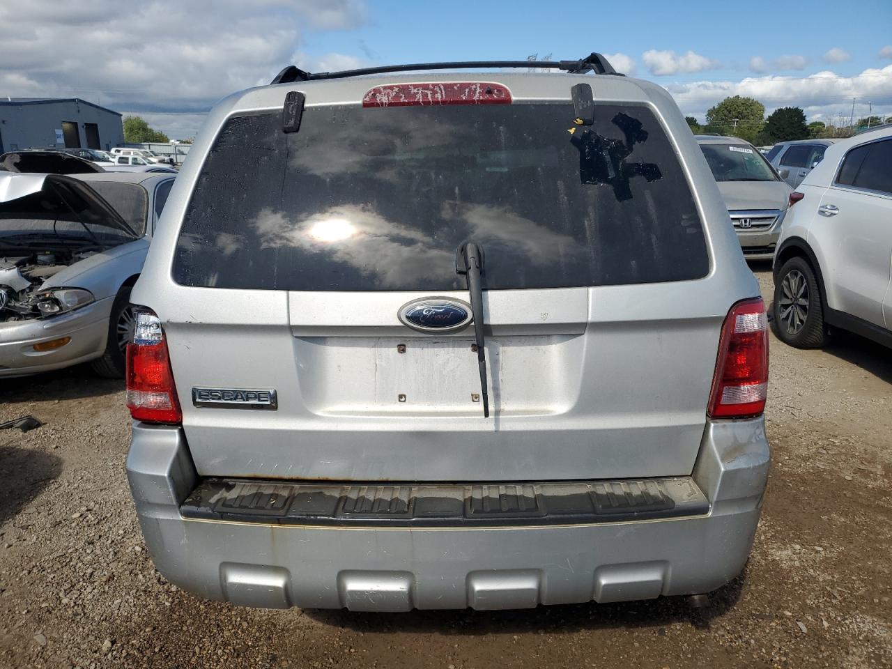 2009 Ford Escape Xlt VIN: 1FMCU03719KA36738 Lot: 70210664