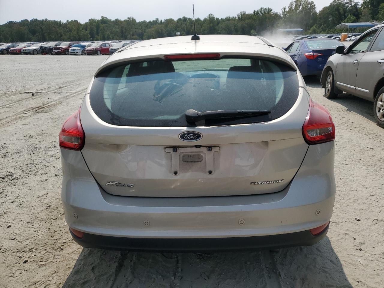 2017 Ford Focus Titanium VIN: 1FADP3N24HL337411 Lot: 71281374