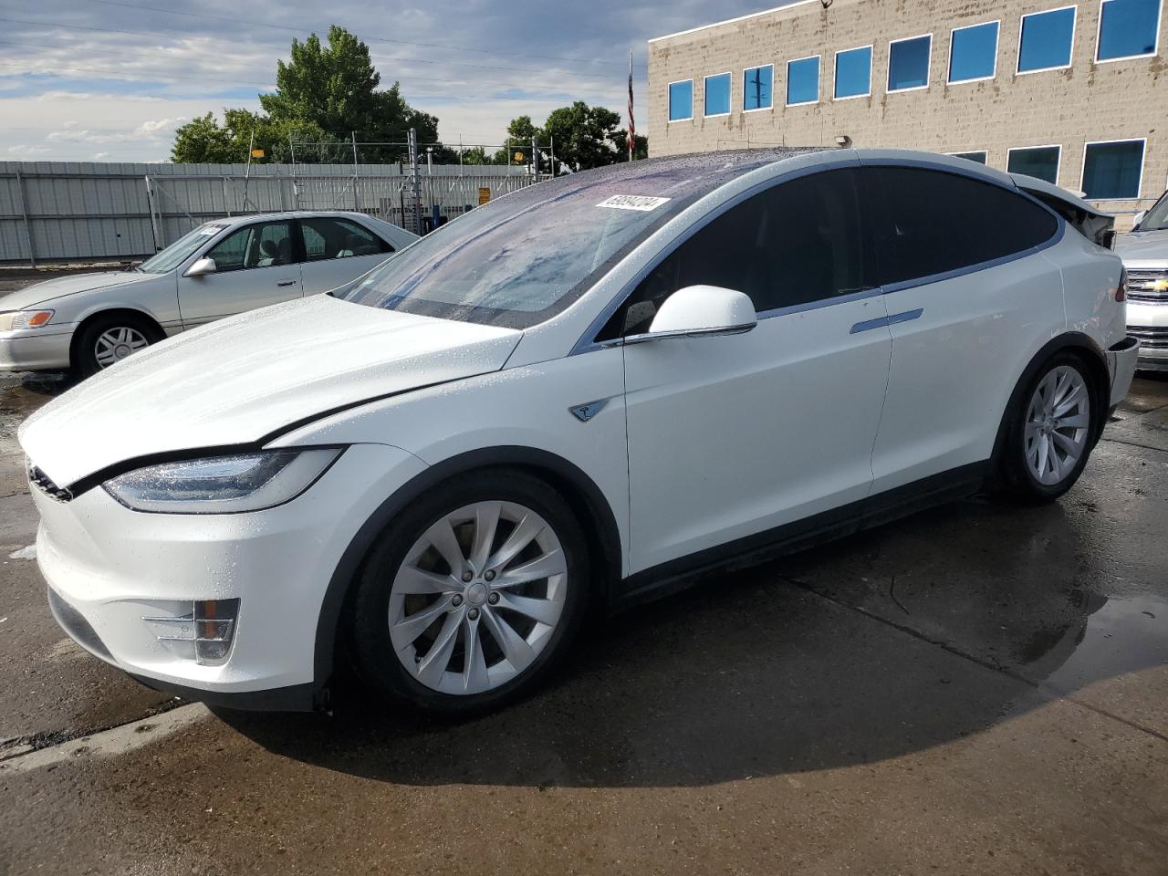 2016 Tesla Model X VIN: 5YJXCBE20GF005299 Lot: 69894204