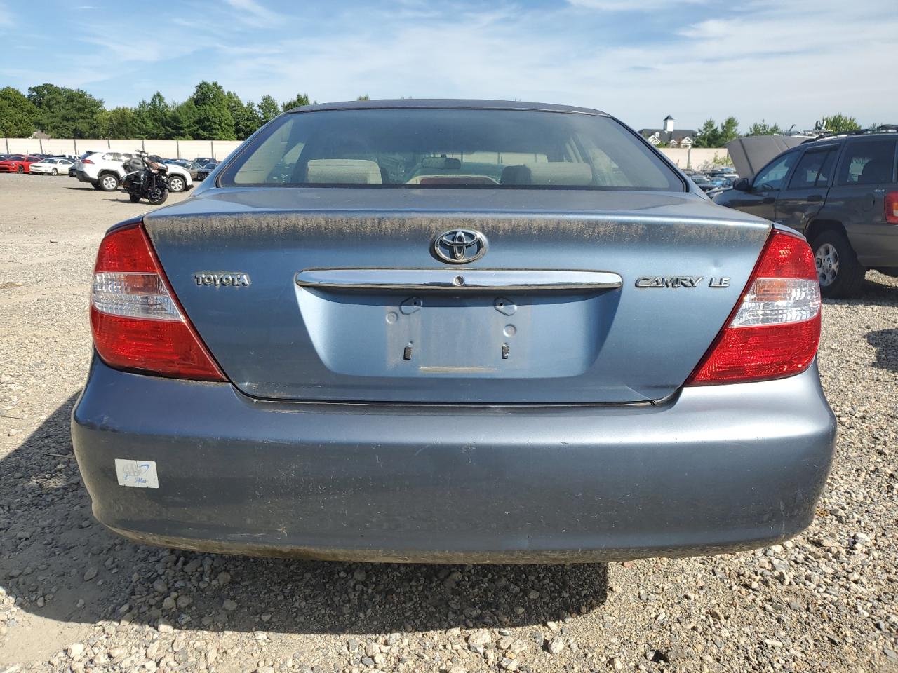 2003 Toyota Camry Le VIN: JTDBE32K430180114 Lot: 70190914