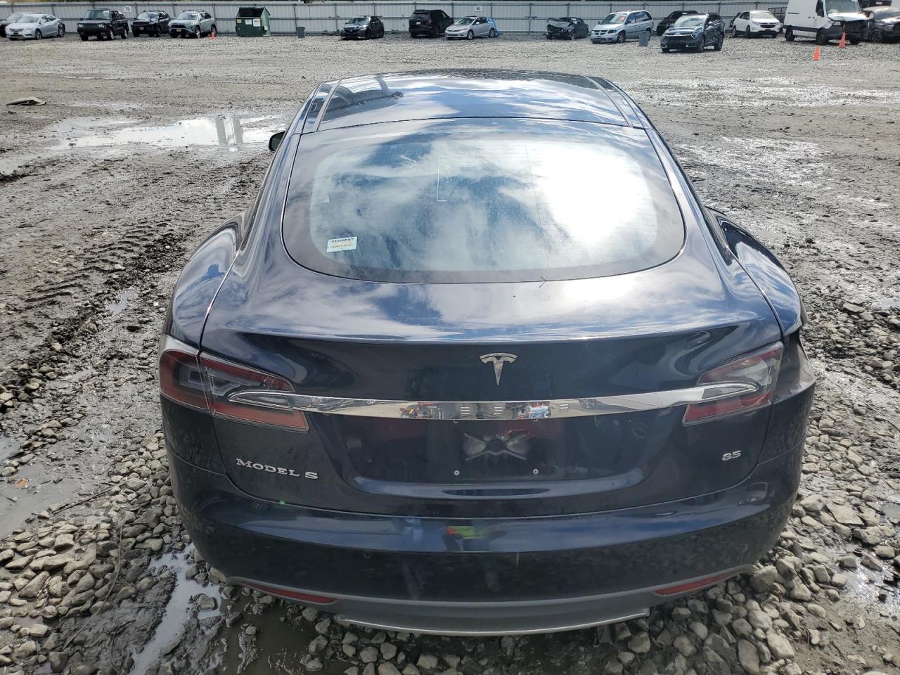 2014 Tesla Model S VIN: 5YJSA1H1XEFP55562 Lot: 73743394