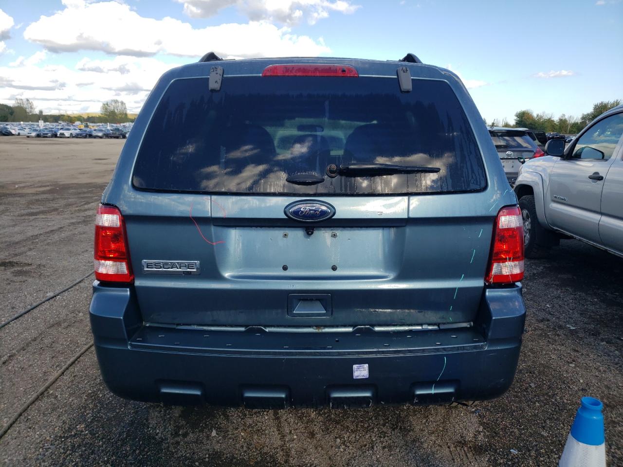 2011 Ford Escape Xlt VIN: 1FMCU0D75BKB31467 Lot: 72112694