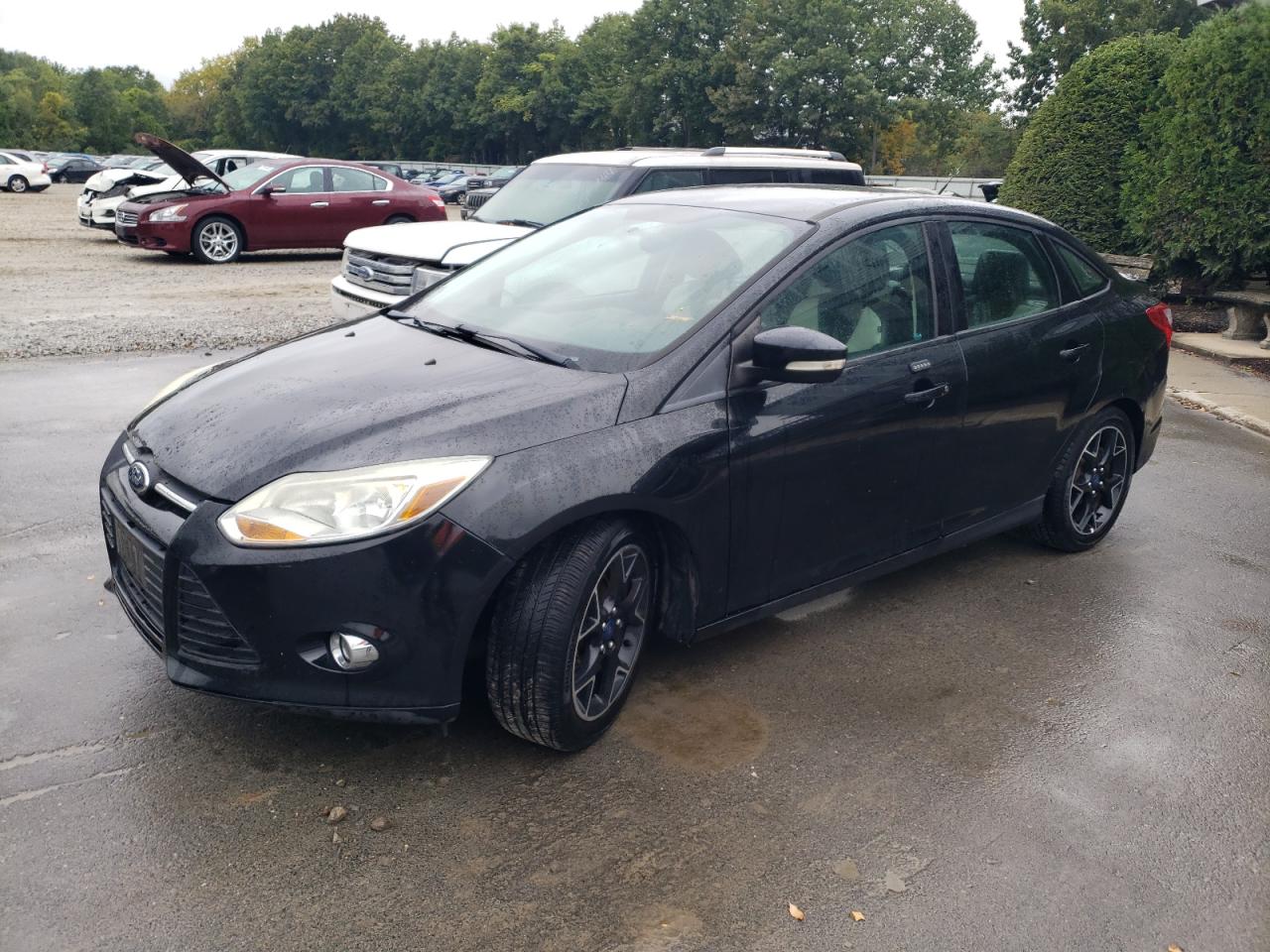 VIN 1FADP3F22EL218833 2014 FORD FOCUS no.1