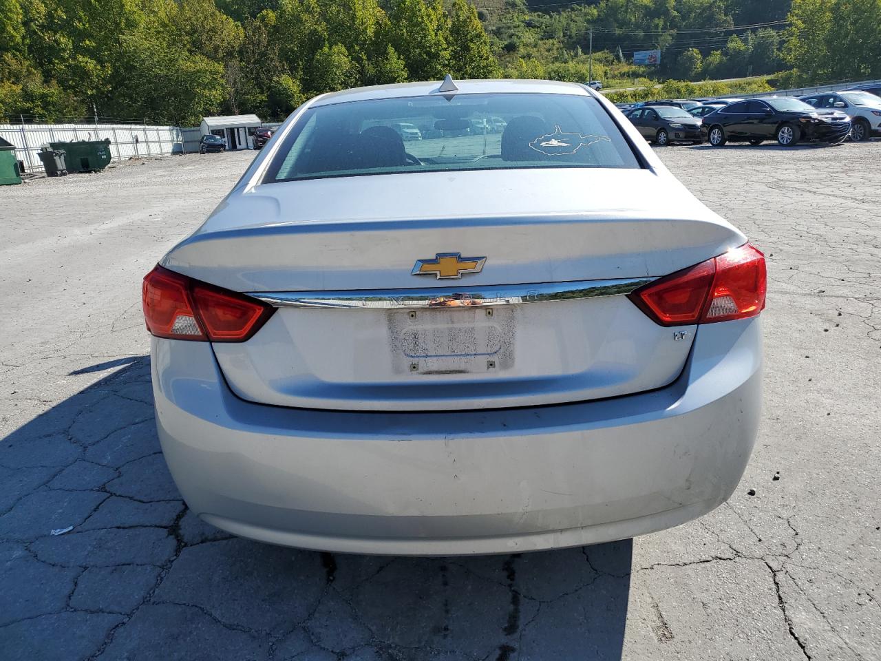 2014 Chevrolet Impala Lt VIN: 2G1125S36E9285490 Lot: 70963114