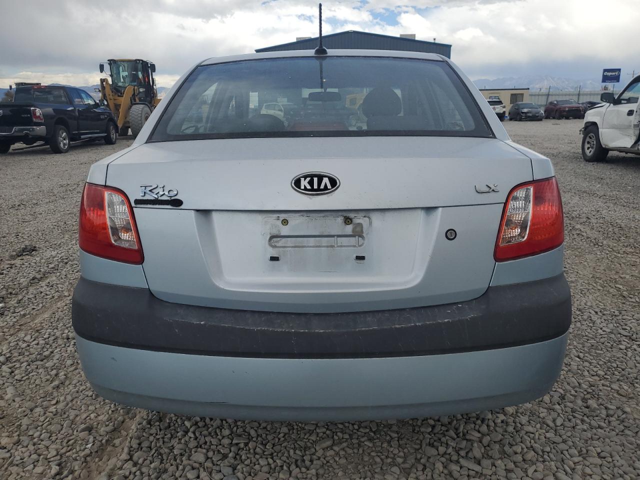 2009 Kia Rio Base VIN: KNADE223496469797 Lot: 71005774