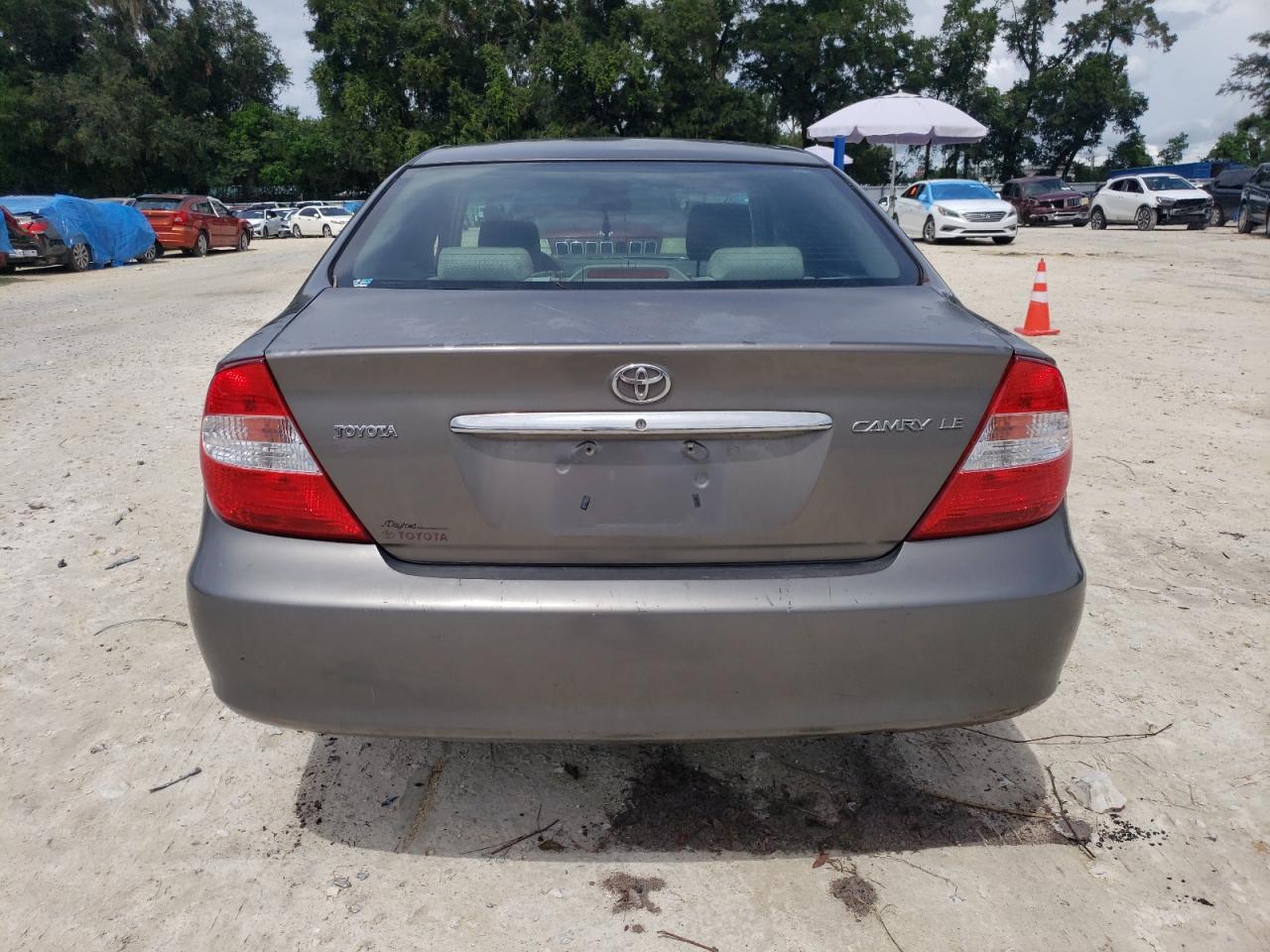 2003 Toyota Camry Le VIN: 4T1BE32K63U710913 Lot: 70792894