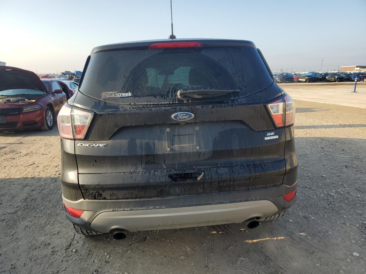 2017 Ford Escape Se VIN: 1FMCU0GD0HUE39998 Lot: 69976354