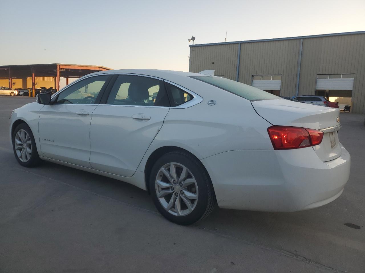 2018 Chevrolet Impala Lt VIN: 2G1105SAXJ9153573 Lot: 70662114