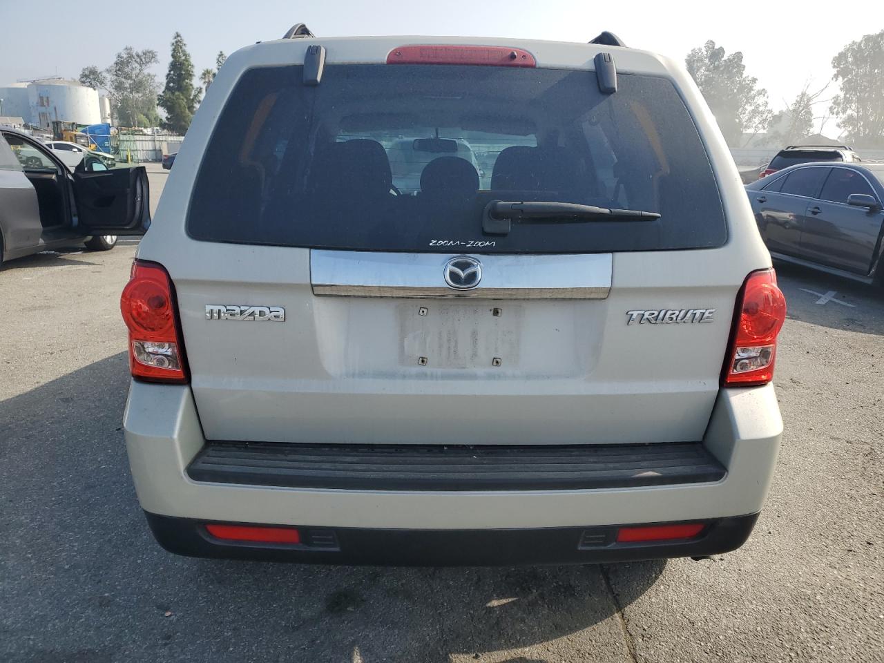 2009 Mazda Tribute I VIN: 4F2CZ02779KM05447 Lot: 73061894