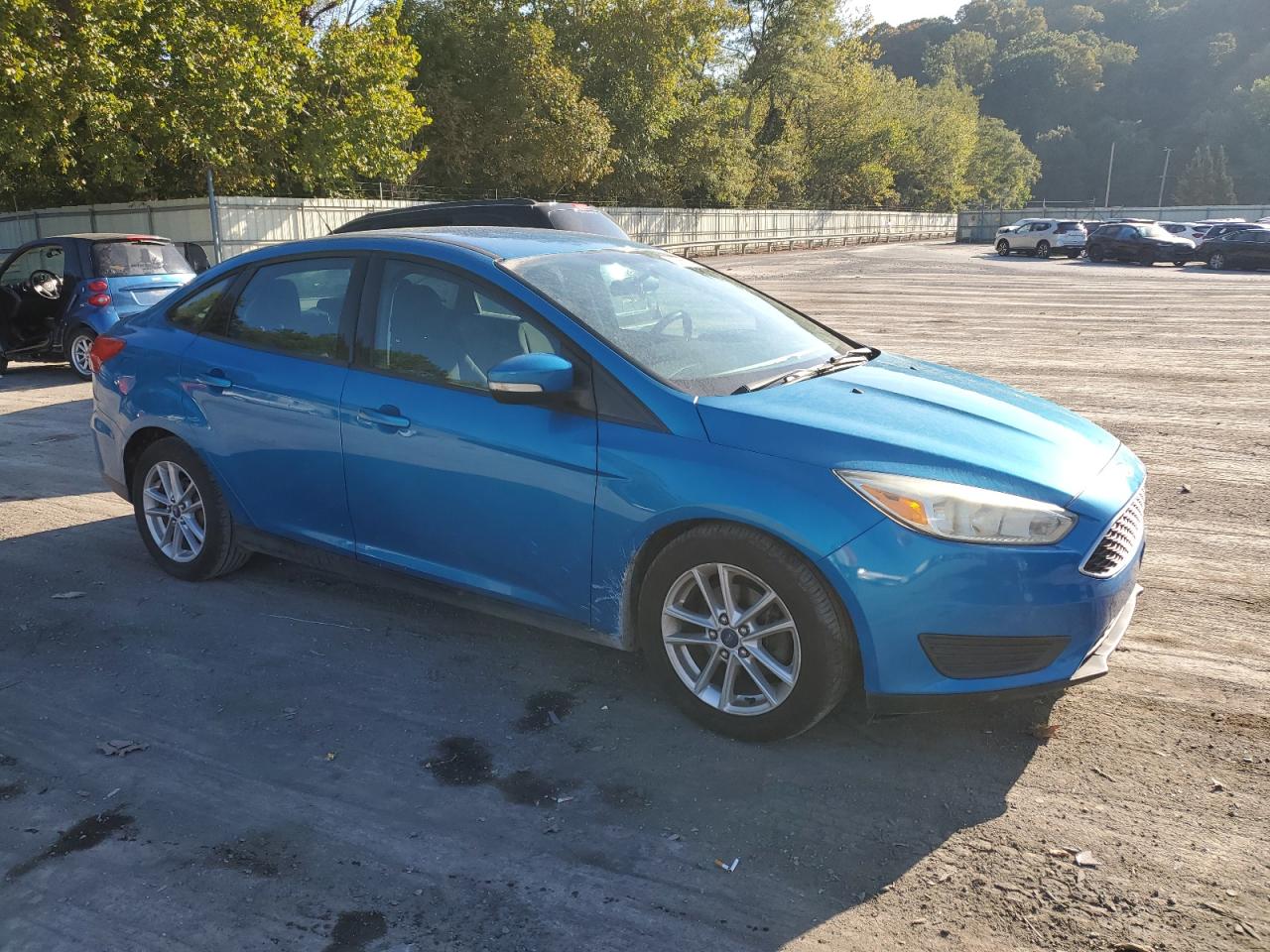 VIN 1FADP3F22FL345650 2015 FORD FOCUS no.4