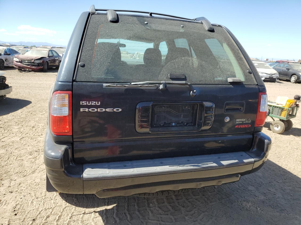 2001 Isuzu Rodeo S VIN: 4S2DM58W914354772 Lot: 72208564