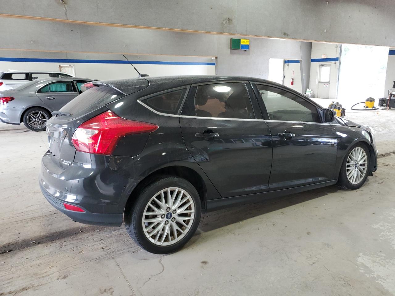 2014 Ford Focus Titanium VIN: 1FADP3N21EL422993 Lot: 71662684