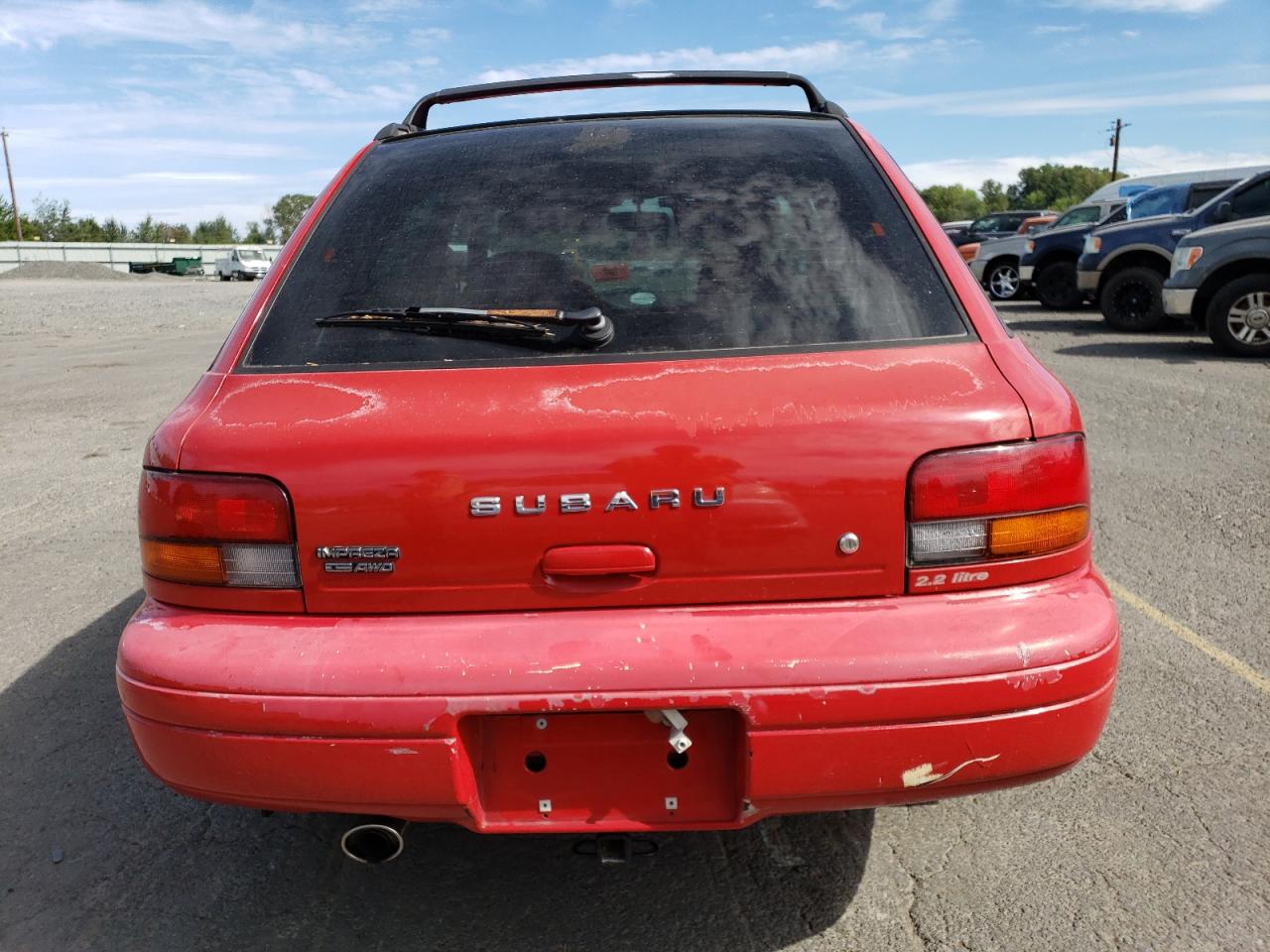 1997 Subaru Impreza L VIN: JF1GF435XVH810083 Lot: 71054674