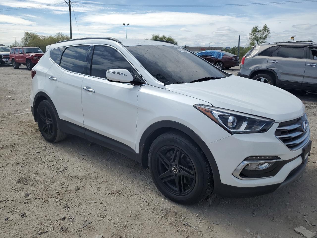 VIN 5NMZU3LB9JH087814 2018 HYUNDAI SANTA FE no.4