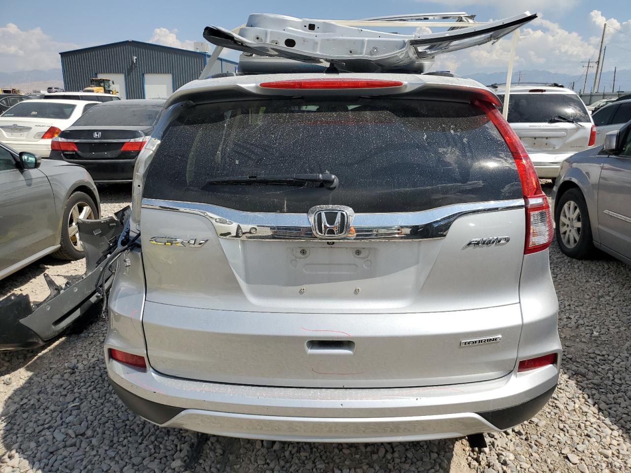 2015 Honda Cr-V Touring VIN: 5J6RM4H96FL011396 Lot: 69810224