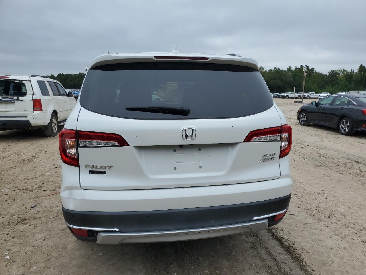 2020 Honda Pilot Elite VIN: 5FNYF6H00LB058799 Lot: 70766564