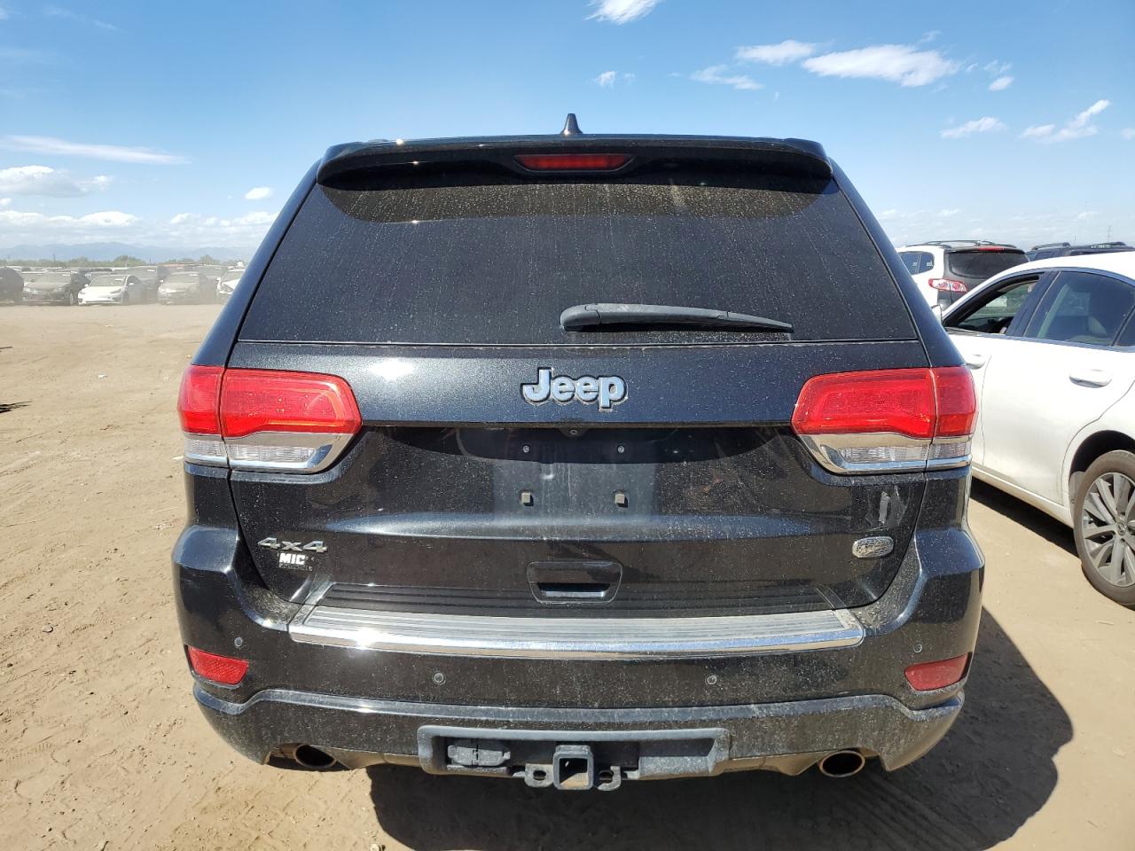 2014 Jeep Grand Cherokee Overland VIN: 1C4RJFCTXEC275734 Lot: 71409864