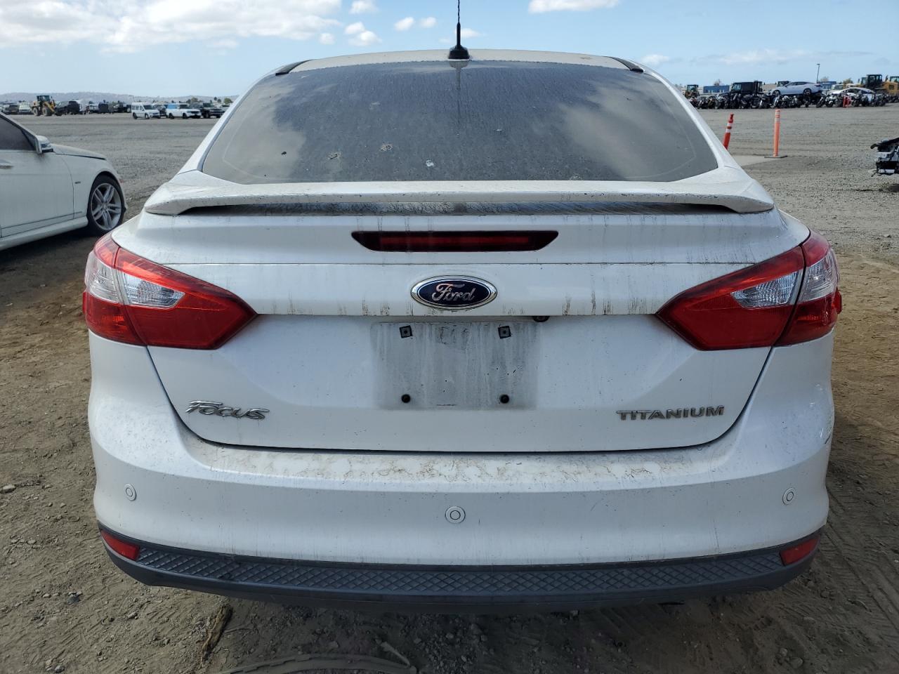 2013 Ford Focus Titanium VIN: 1FADP3J23DL373896 Lot: 71795864