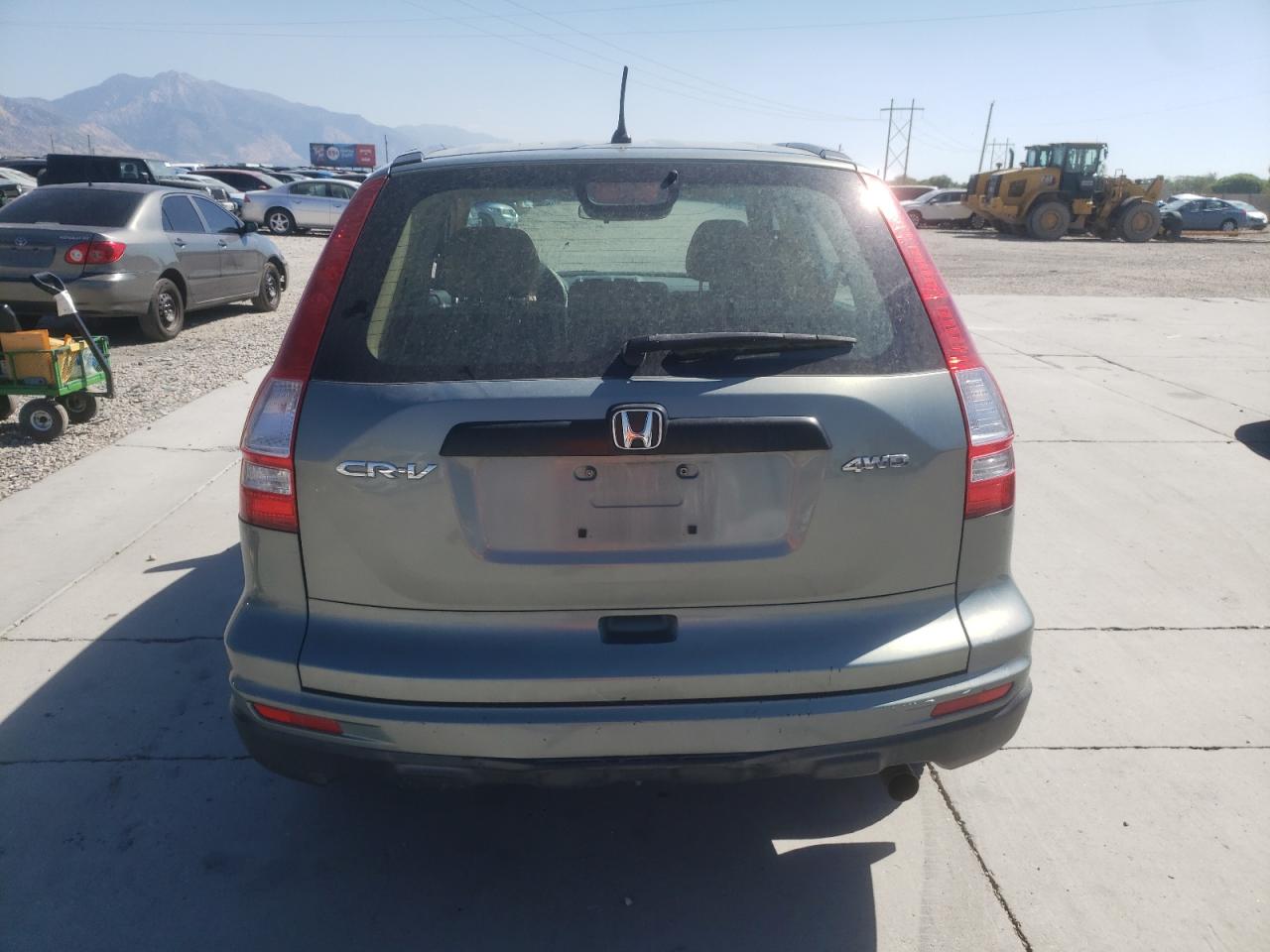 2010 Honda Cr-V Lx VIN: JHLRE4H30AC003174 Lot: 70404634