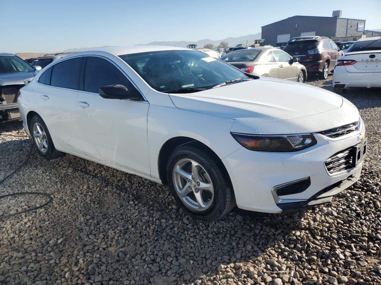 VIN 1G1ZB5ST7HF255512 2017 CHEVROLET MALIBU no.4