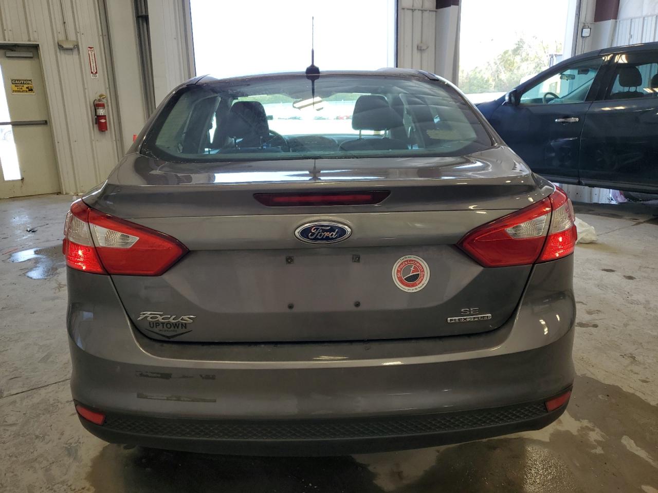 2014 Ford Focus Se VIN: 1FADP3F21EL205166 Lot: 72141294