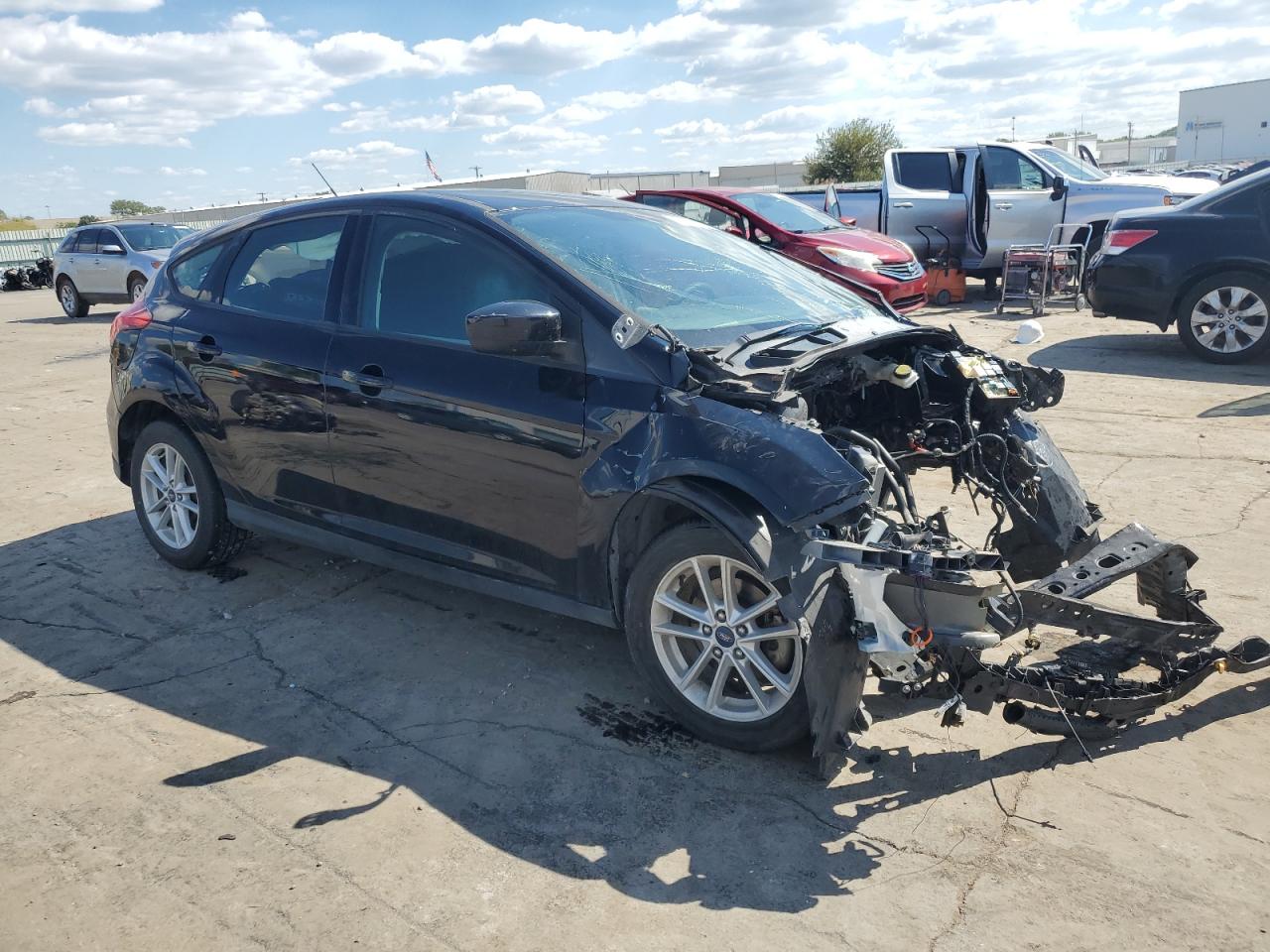 VIN 1FADP3K2XJL299936 2018 FORD FOCUS no.4