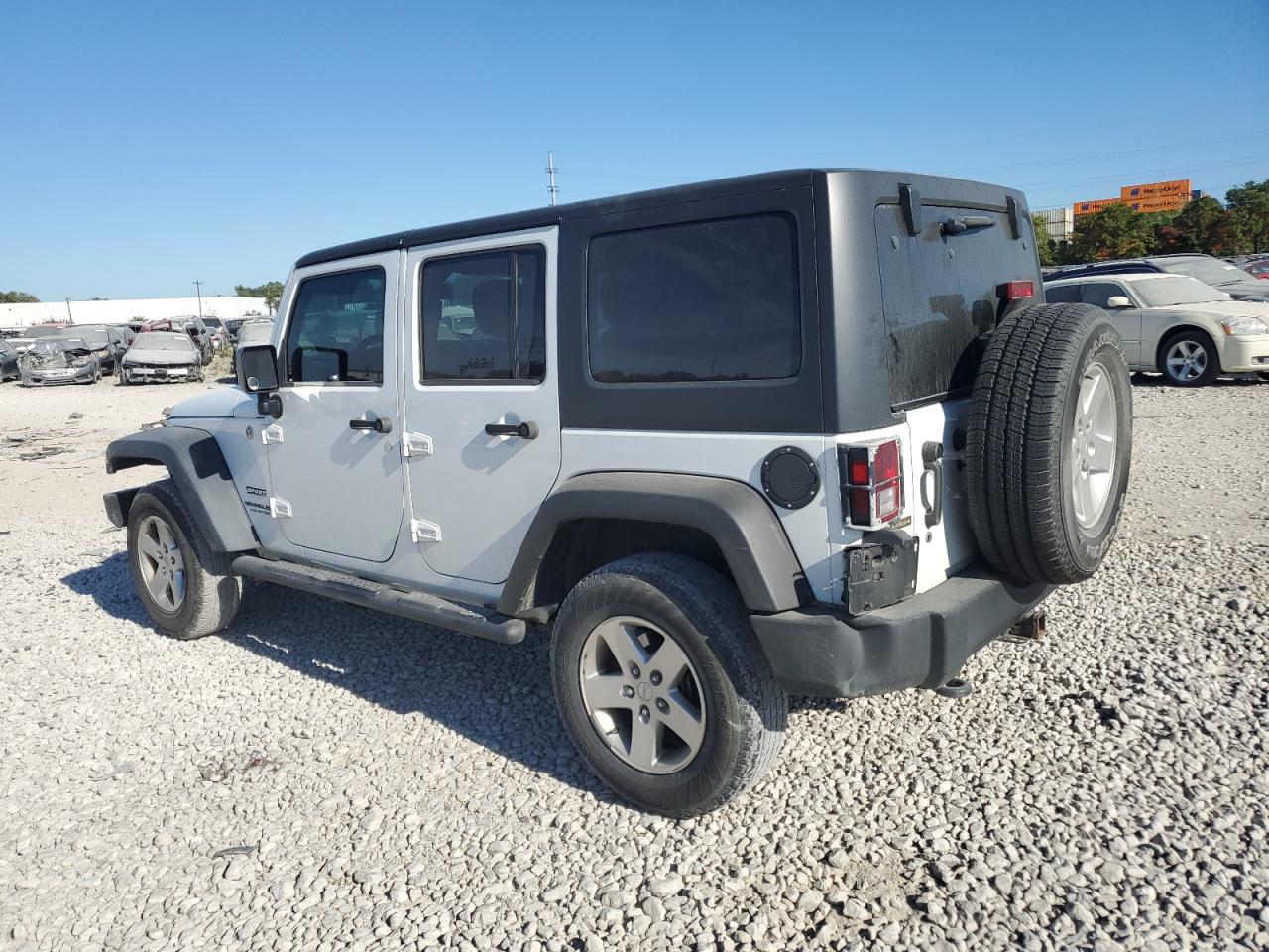 1C4HJWDG6EL208268 2014 Jeep Wrangler Unlimited Sport