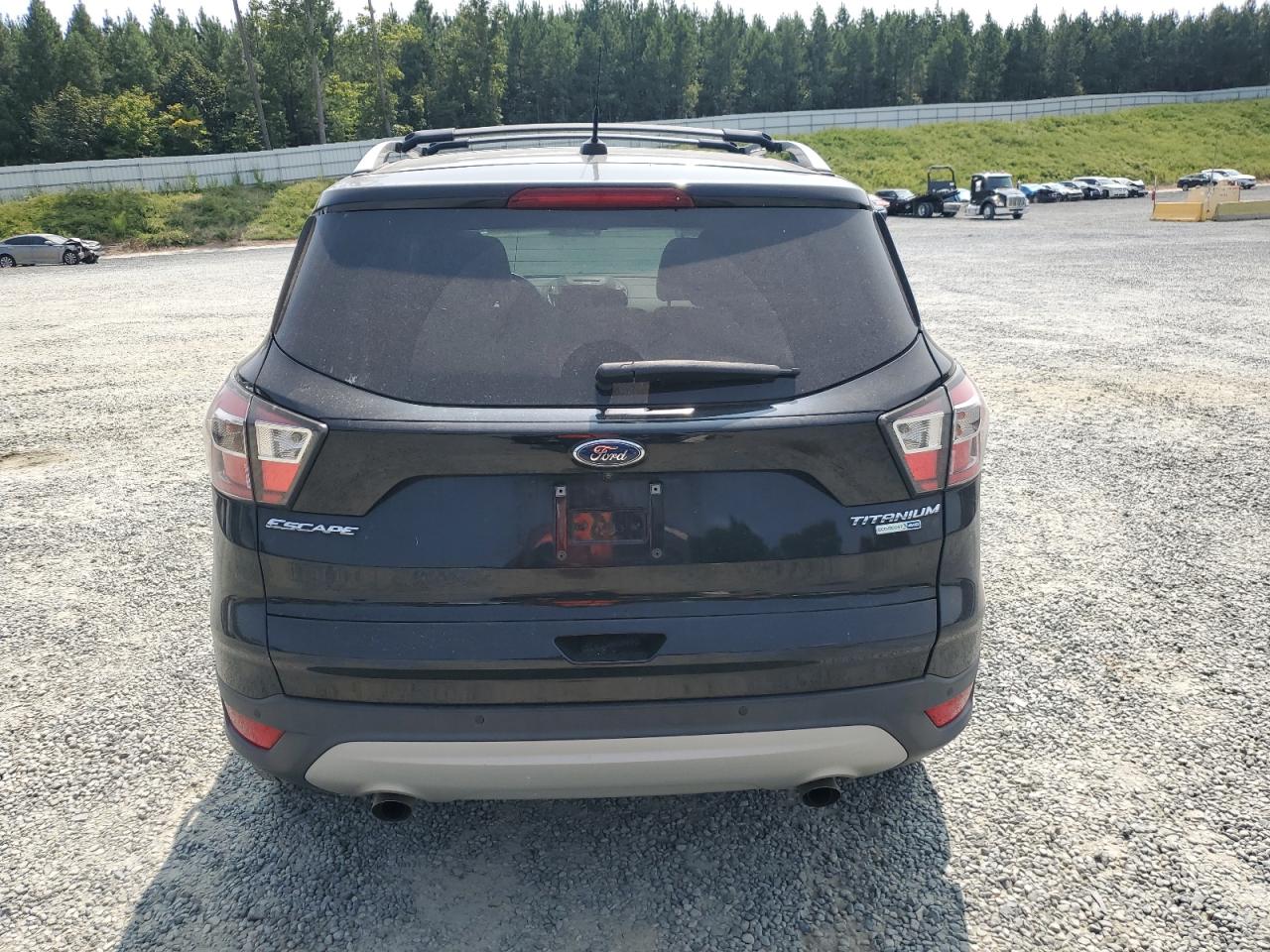 2017 Ford Escape Titanium VIN: 1FMCU9JD4HUA87411 Lot: 70763154