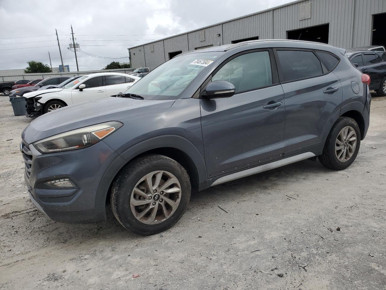 KM8J33A29HU475675 2017 HYUNDAI TUCSON - Image 1