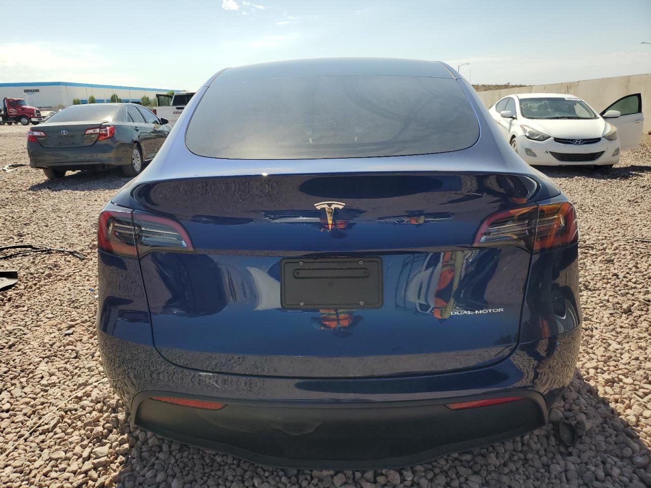 2023 Tesla Model Y VIN: 7SAYGDEE0PF851028 Lot: 73797434