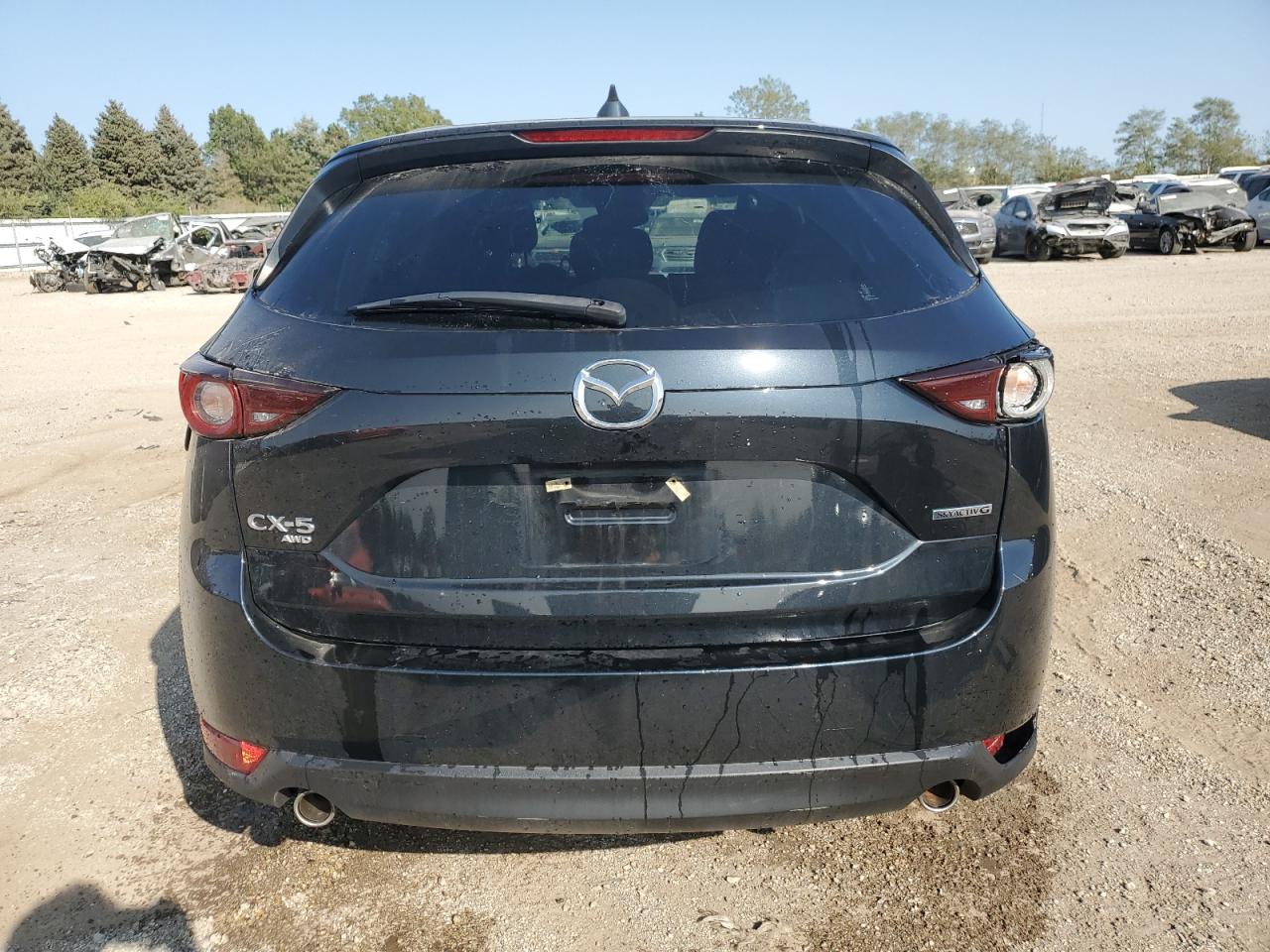 2020 Mazda Cx-5 Touring VIN: JM3KFBCM5L0858450 Lot: 70603354