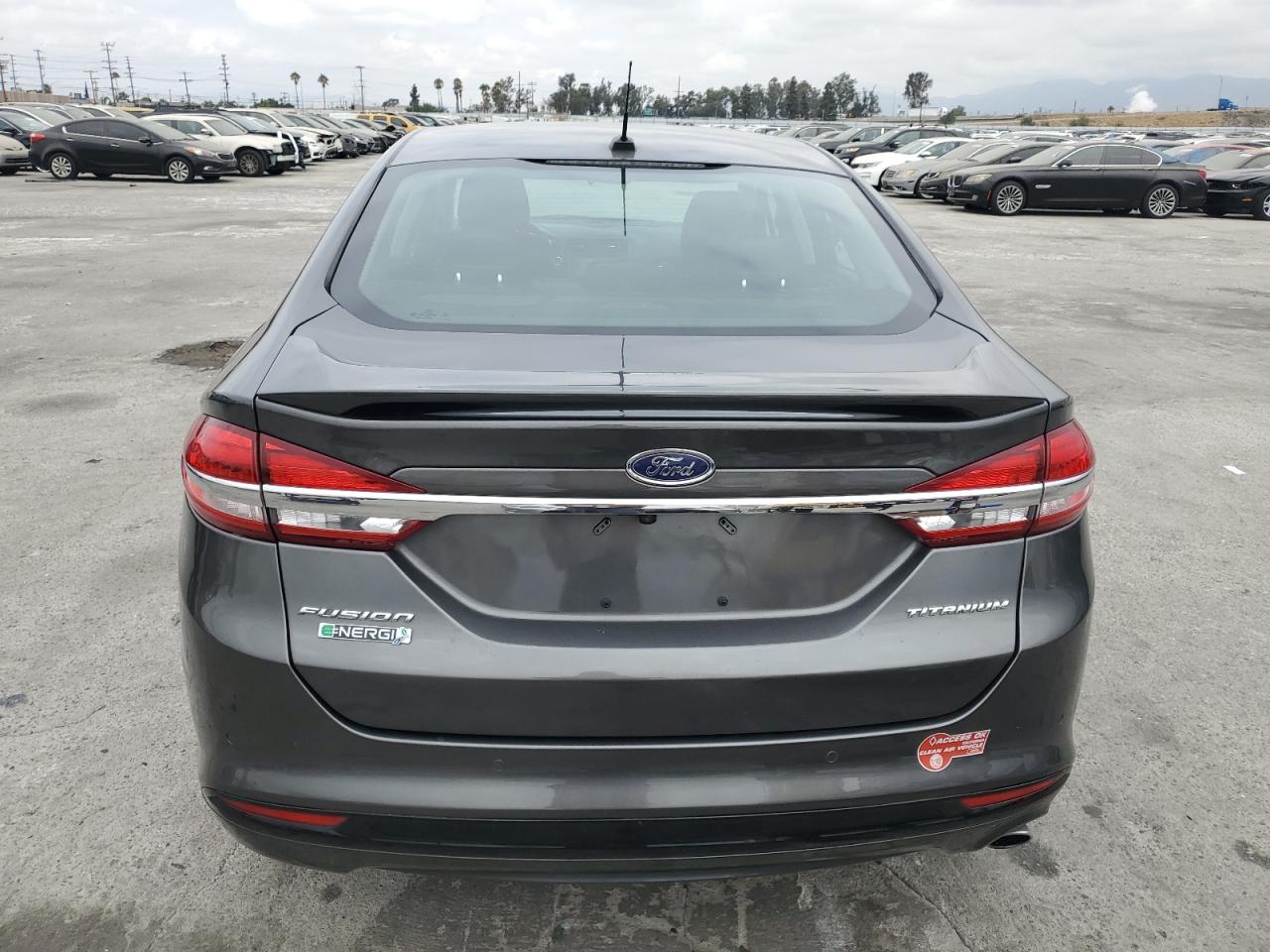 2017 Ford Fusion Titanium Phev VIN: 3FA6P0SU4HR306528 Lot: 72190174