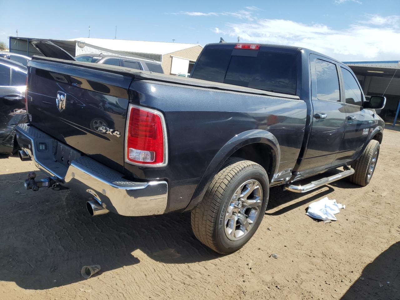 2015 Ram 1500 Laramie VIN: 1C6RR7VT9FS653083 Lot: 69993044