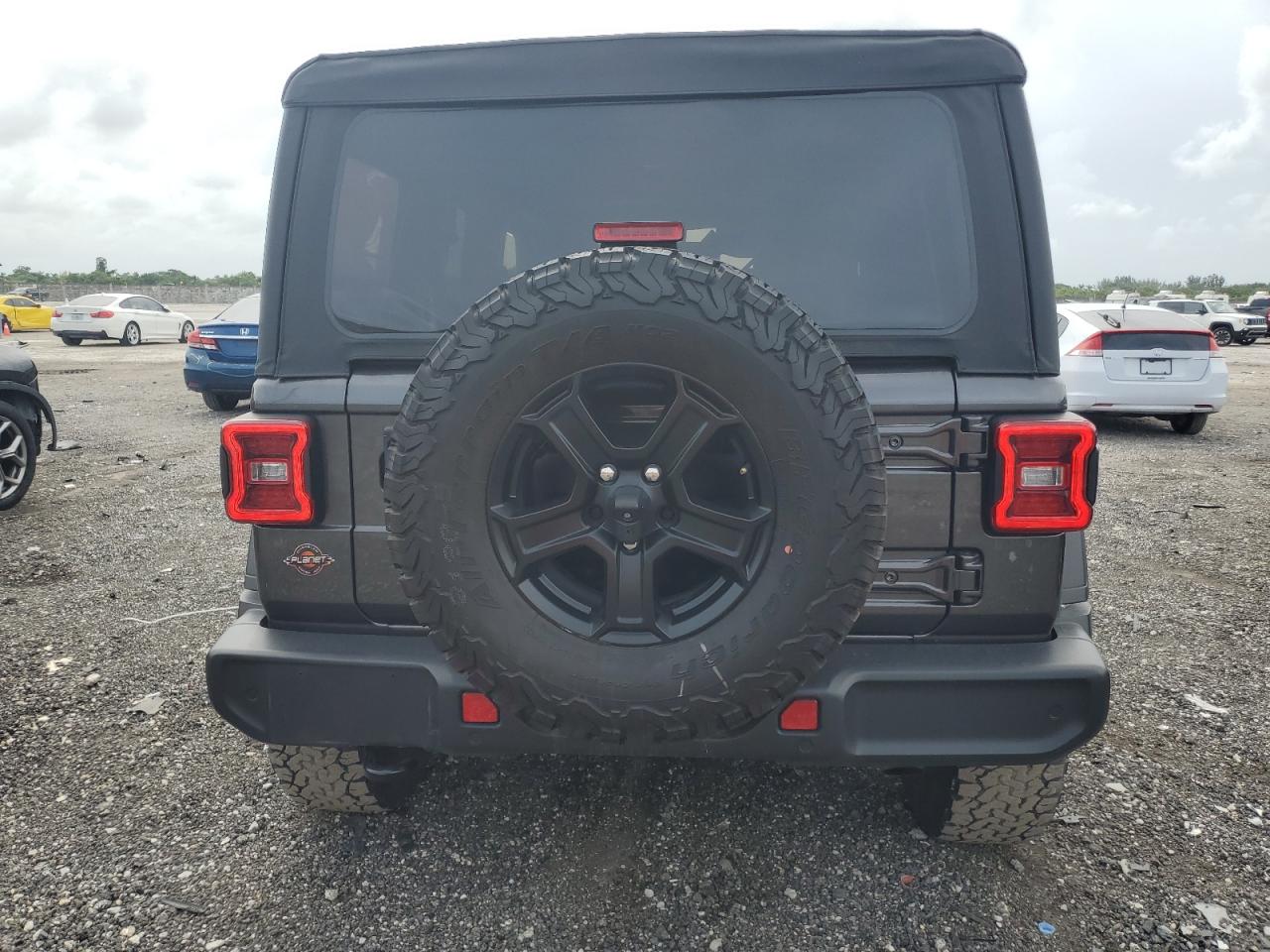 1C4HJXDG5MW840875 2021 Jeep Wrangler Unlimited Sport