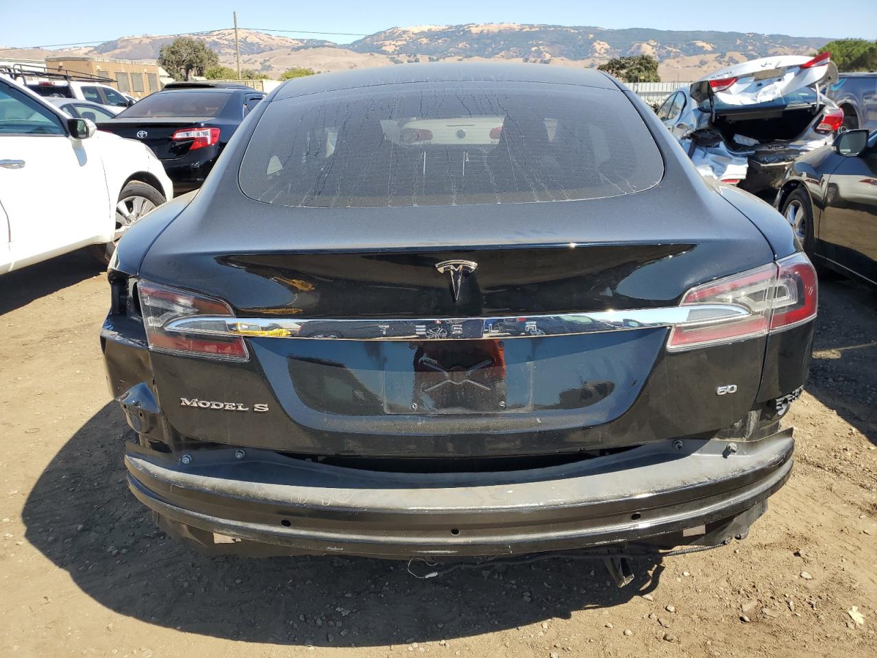 2014 Tesla Model S VIN: 5YJSA1S19EFP66979 Lot: 73599694