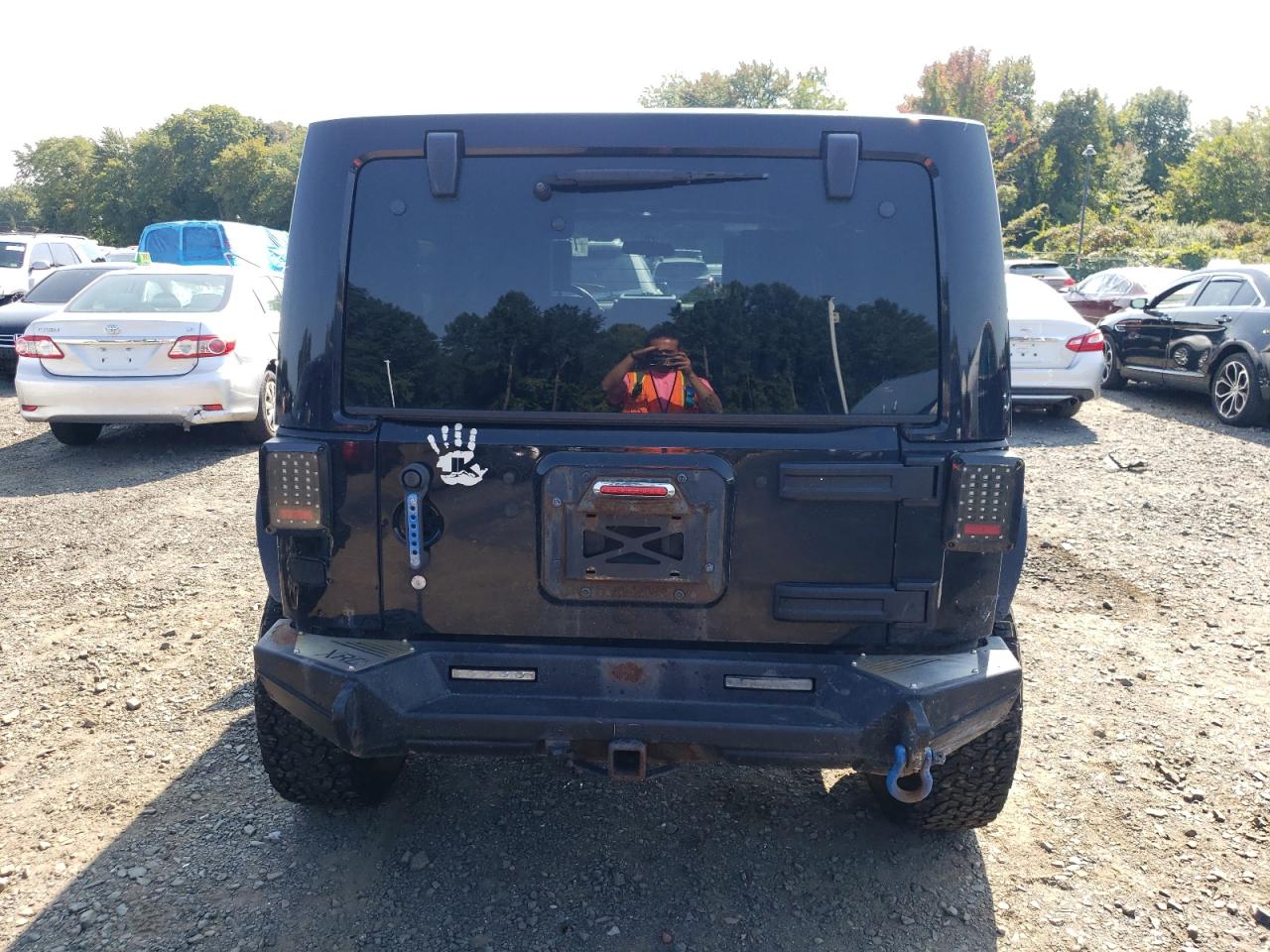 2009 Jeep Wrangler Unlimited Sahara VIN: 1J8GA591X9L739028 Lot: 71052274