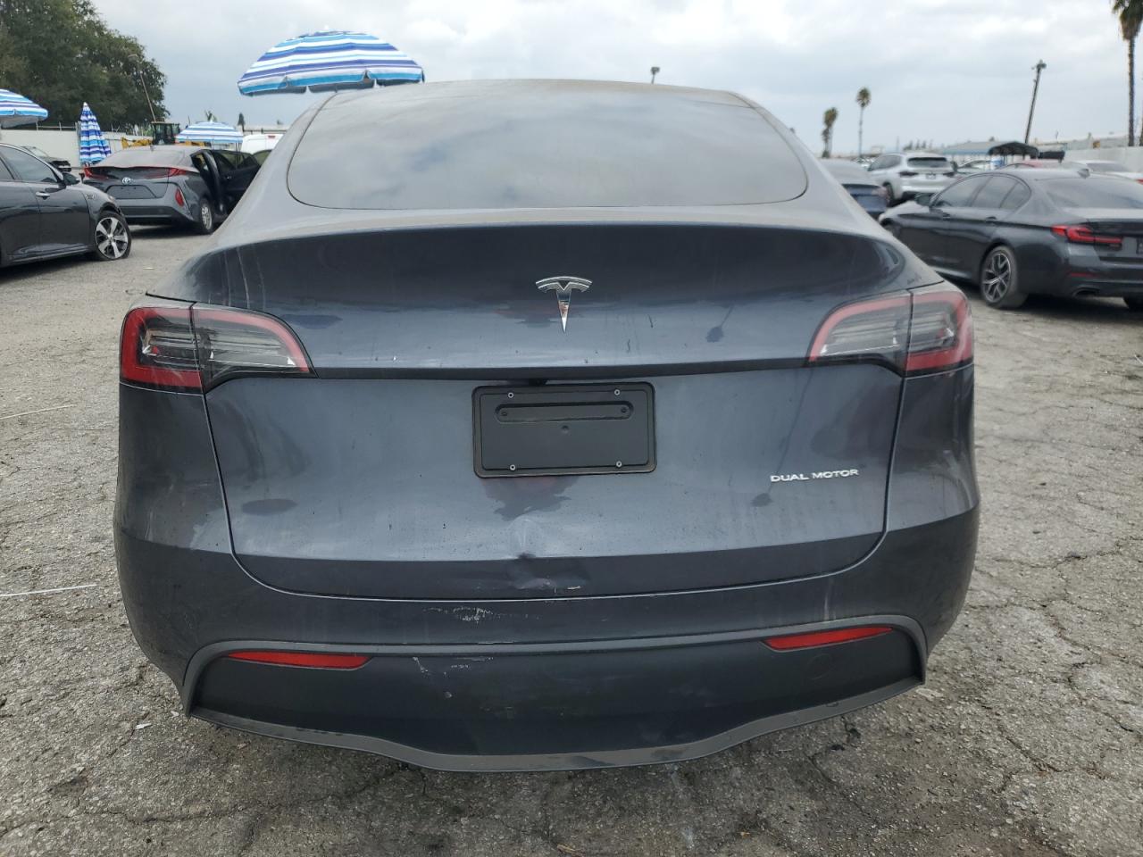 2023 Tesla Model Y VIN: 7SAYGDEE1PF899301 Lot: 72255244