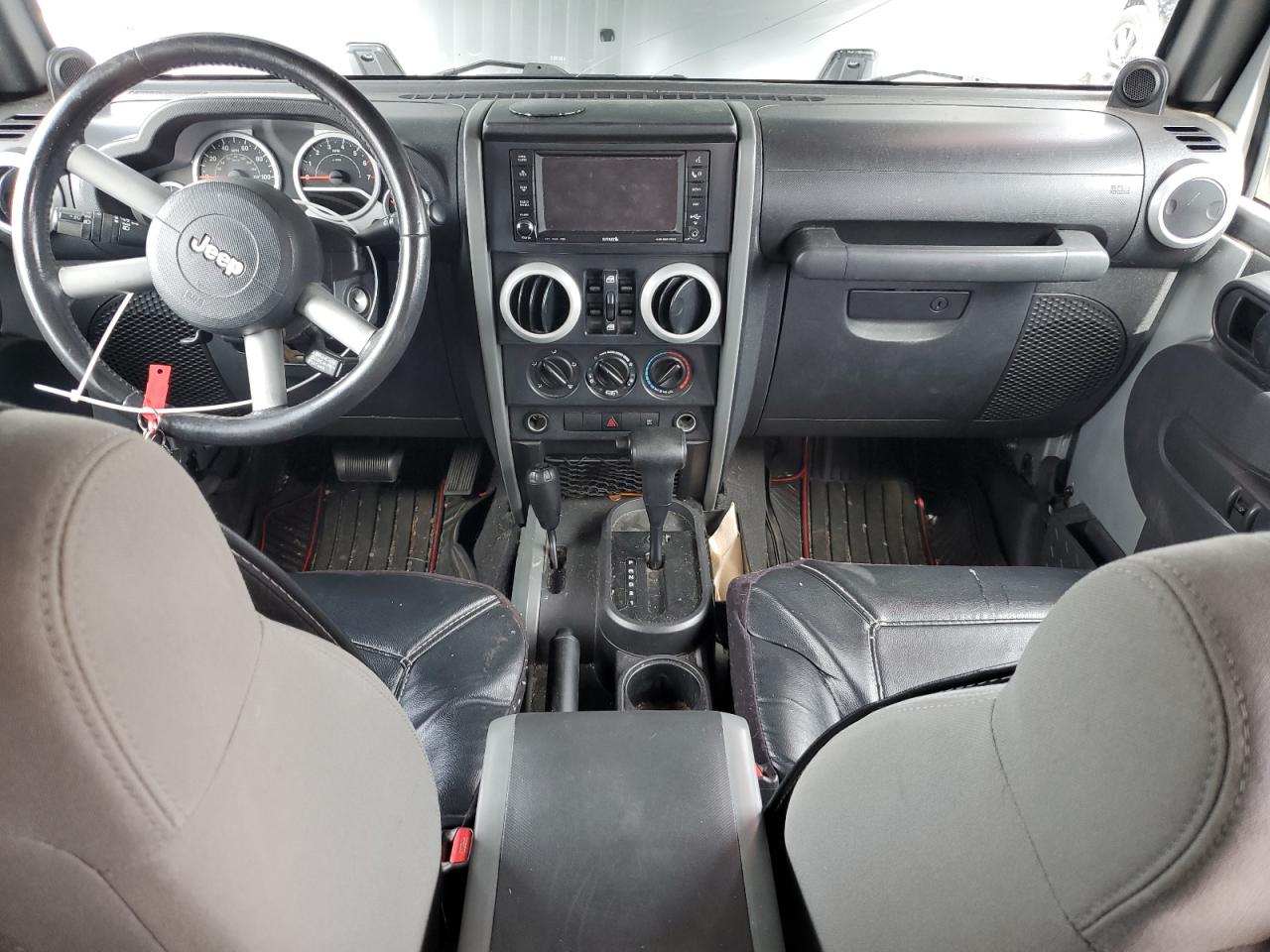2009 Jeep Wrangler Unlimited Sahara VIN: 1J4GA59169L727279 Lot: 83795245