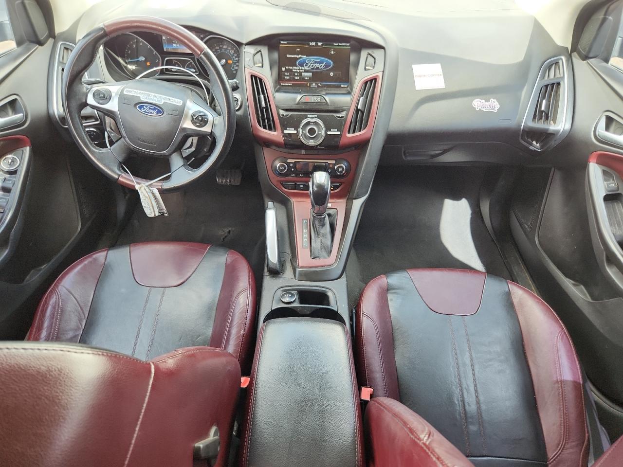 2012 Ford Focus Titanium VIN: 1FAHP3N29CL215847 Lot: 81211335